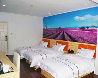 جوانجزو تشينزو هوتل - غوانغزهو - غرفة نوم