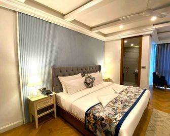 Hotel Sapling Mussoorie - 500 Mtr from Picture Palace Mall Road - Mussoorie - Schlafzimmer