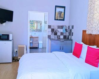 Steps Guest House - Puerto Elizabeth - Habitación