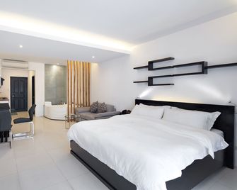 Winds Boutique Hotel - Angeles City - Bedroom