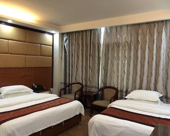 Puqian Business Hotel - Che-jüan - Ložnice