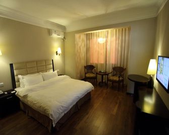 Camilla Anshan Hotel - Аньшань