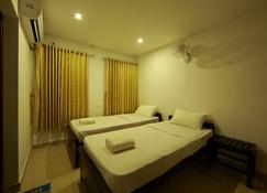Sara Hotels and Apartments - Angamāli - Bedroom