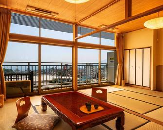 Ooedo Onsen Monogatari Premium Hotel Fugetsu - Beppu - Living room