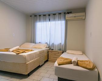 Suites 91 - Penha - Quarto
