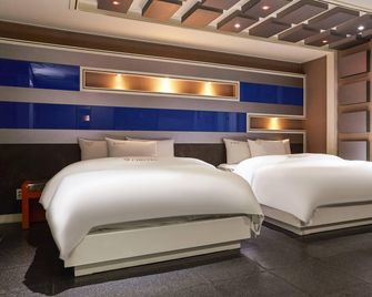 Chuncheon Aye Hotel - Chuncheon - Camera da letto