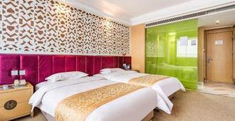 Yuelong Leisure Business Hotel - Datong - Schlafzimmer