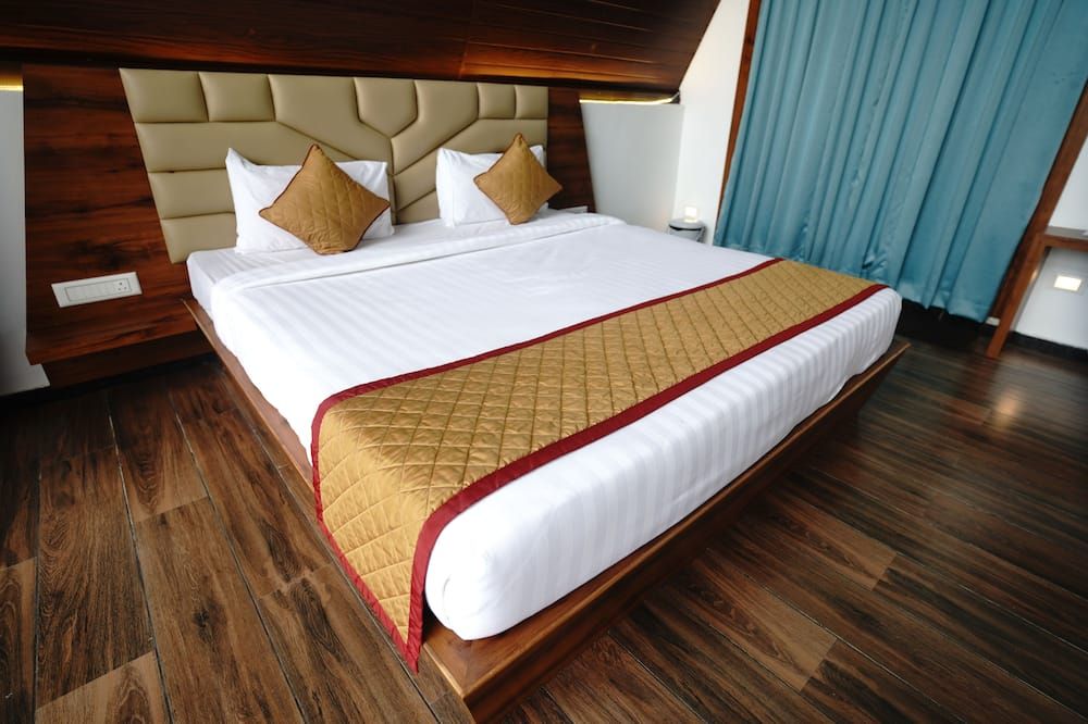 Q Mango Resort - באנגאלור - חדר שינה