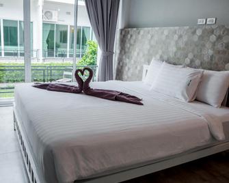 Kosit One Hotel - Bueng Sam Phan - Camera da letto