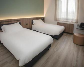 Moody smart & comfy Hotel - Terranuova Bracciolini - Ložnice