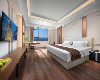 Tianhe Hotel - Leshan - Camera da letto