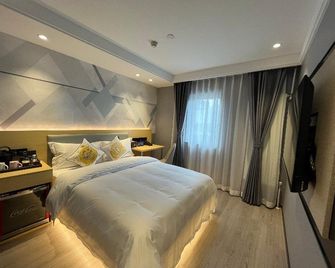 Mingcheng Hotel Beijing - Beijing - Bedroom