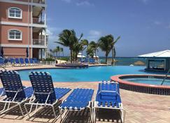 Newly Renovated 'Condo & Balcony To The Turquoise Waters & Sun Bleached Sands' - East End - Pool