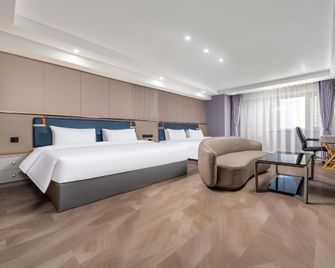 Meilan Hotel (Qiqihar Wanda Branch) - Qiqihar - Yatak Odası