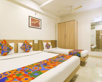 Hotel Balaji Inn - Nashik - Camera da letto