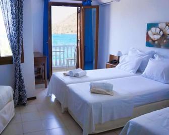 Captain's House Hotel - Skala - Slaapkamer