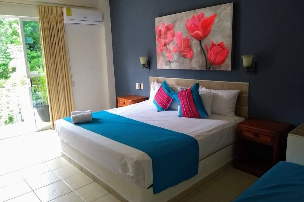 Hotel Arenas del Pacifico - La Crucecita - Camera da letto