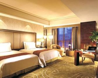 Jie Hao Royal Hotel - Shenzhen - Slaapkamer