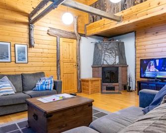 Holiday Home Runoniekka by Interhome - Rautalampi - Sala de estar