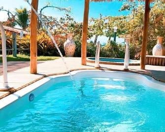 Pousada Axe - Cumuruxatiba - Pool