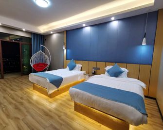 Shanshui Shiji Holiday Hotel - Wenchang - Camera da letto