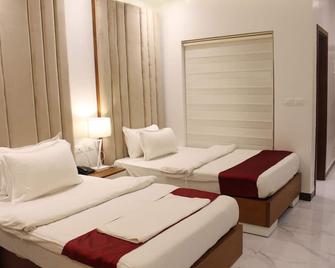 هوتل بيل في - كينشاسا - غرفة نوم