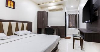 Hotel Ashish - Ahmedabad - Bedroom