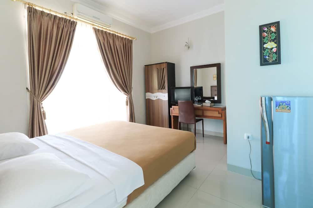 Ge Jacmart Homestay Makassar - Makassar - Bedroom