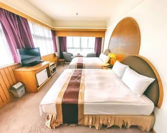 Foung Jia Hotel - Magong City - Bedroom
