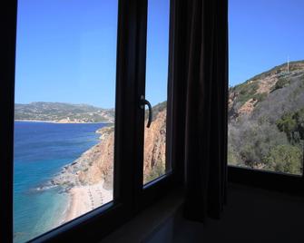 Nuraghe Apartments - Teulada - Salon