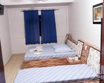 Hotel Mustang - São Paulo - Schlafzimmer