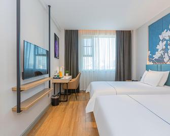 جنجيانج إن نانشانج مند رود - نانتشانغ - غرفة نوم