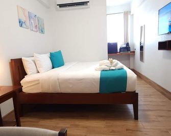 Voyager Sun & Reef Hotel - San Pedro Town - Ložnice