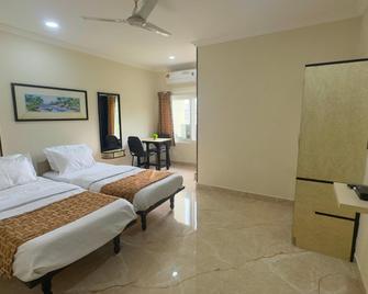 Kodali Guest Suites - Secunderabad - Slaapkamer