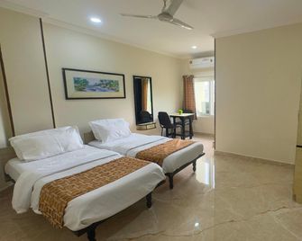 Kodali Guest Suites - Secunderabad - Ložnice