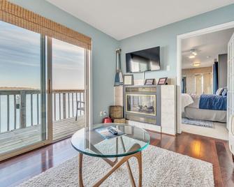 Penthouse Suite, gorgeous West Lake Okoboji views, 1 BDRM above shopping center - Arnolds Park - Living room
