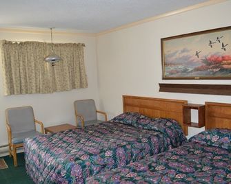 Capri Motel By OYO Elwood, Wathena - Wathena - Habitación