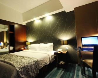 Jinjiang Metropolo Fuzhou Cangshan - פוז'ו - חדר שינה