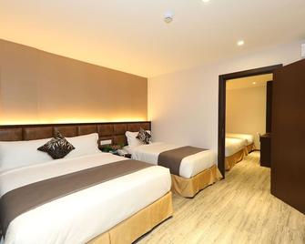 M&M Hotel - קואלה לומפור - חדר שינה