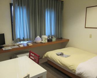 Hotel Crown Hills Kitami Annex - Kitami - Slaapkamer