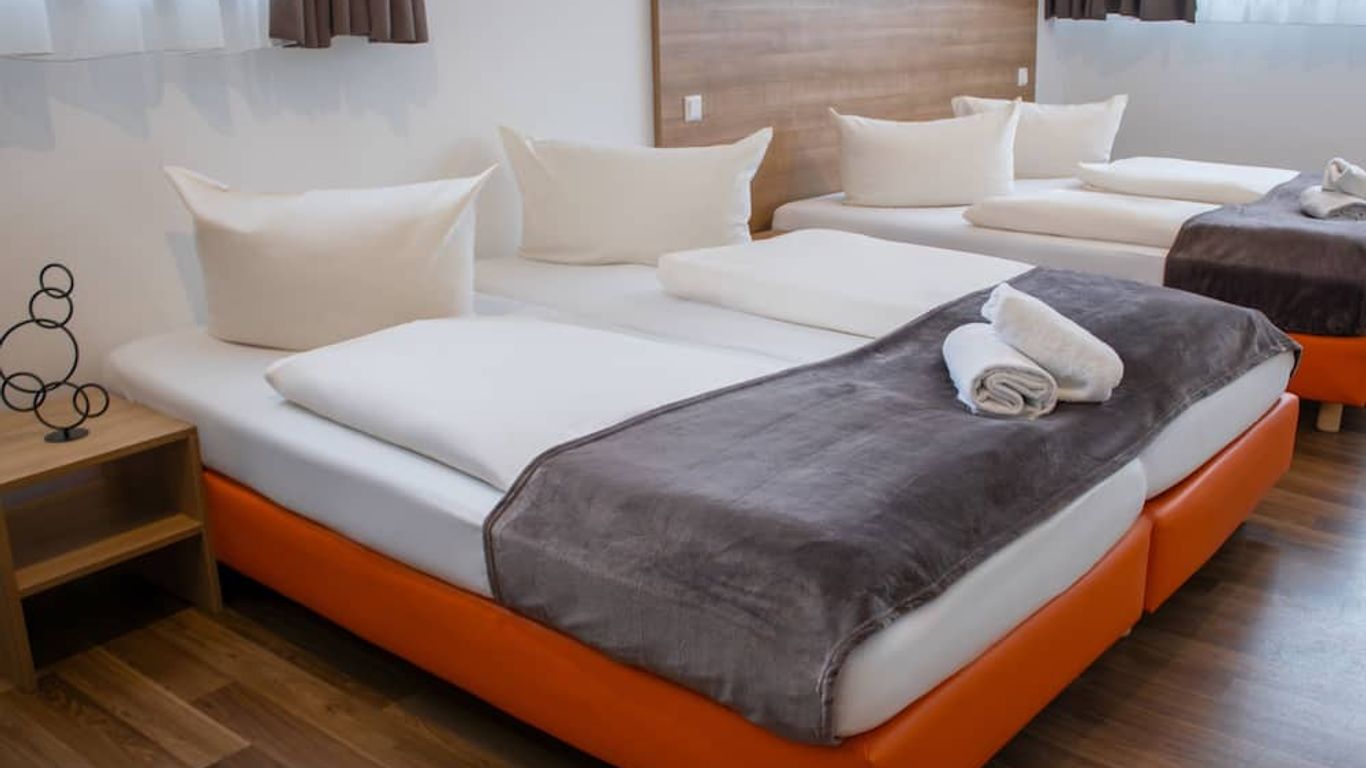 Orange Hotel und Apartments
