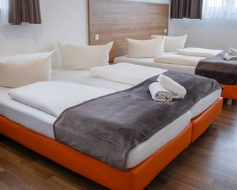 Orange Hotel und Apartments - Neu Ulm - Bedroom