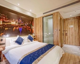 Hanting Premium Hotel Youjia Nanjing Olympic Sports Center - Nankín - Habitación