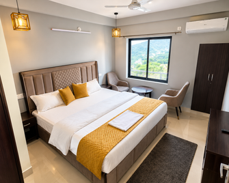 Goroomgo Kaffal Hotel And Restaurant Rudraprayag - Rudraprayāg - Bedroom