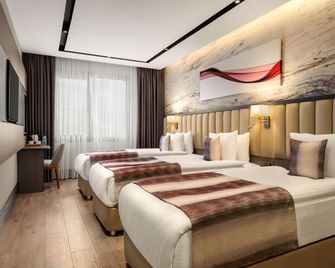 Ramada by Wyndham Istanbul Umraniye - Istanbul - Schlafzimmer