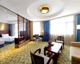 Carey Harmony Dunp Hotel Grand Cross Centre - Qiandongnan - Living room