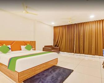 Hotel Fun Regency - Dasāda - Bedroom