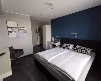 Hotel Come In - Menden - Спальня
