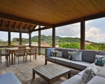 Caribbean Jewel by Island House Vacation Rentals - West Bay - Living room