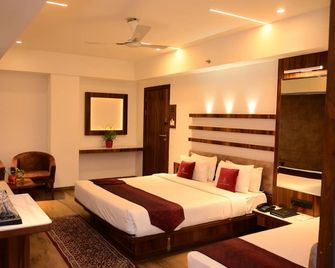 Pravasa hotel Indore - Indore - Yatak Odası